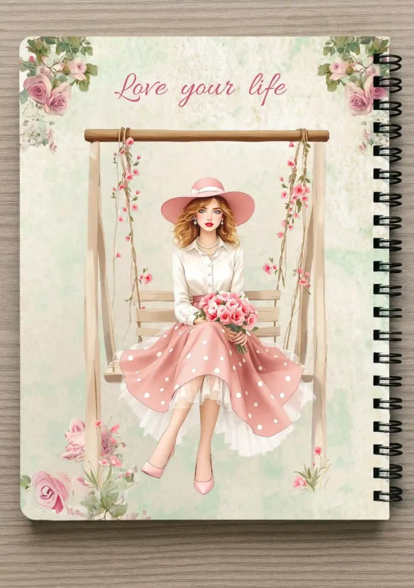 מחברת ספירלה A5 וסימניה תואמת - אישה יושבת בנדנדה ואוחזת בזר פרחים "Love your life"